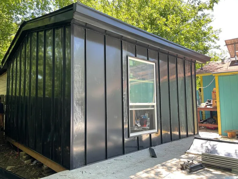 Black standing seam metal wall panels for Roof Inspection in Rosemead